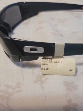 Oakley Black Matte Sunglasses with Gray Lenses